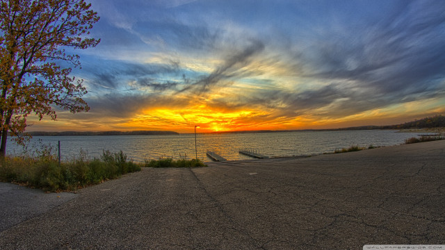 Sunset water tree fence foreground free wallpaper - medium preview image
