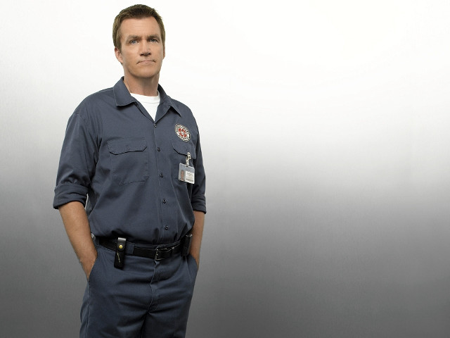 Man blue uniform standing wall free wallpaper - medium preview image