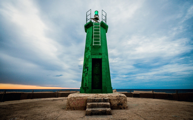 Green lighthouse ladder person standing free wallpaper - medium preview image