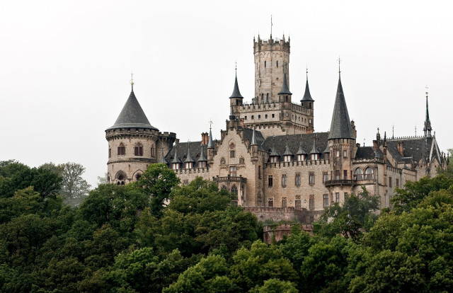 Castle towers hill trees sky free wallpaper - medium preview image