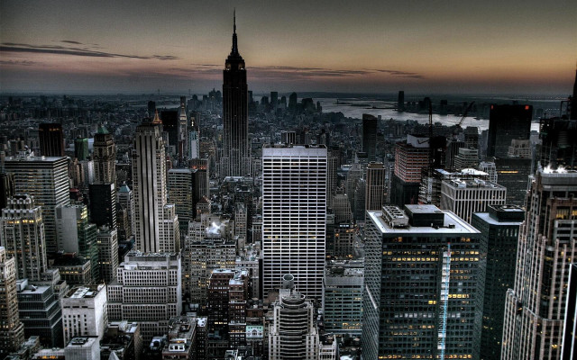 Cityscape tall buildings sunset background free wallpaper for desktop - medium preview image