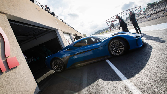 Blue sports car parking lot #8 free wallpaper - medium preview image