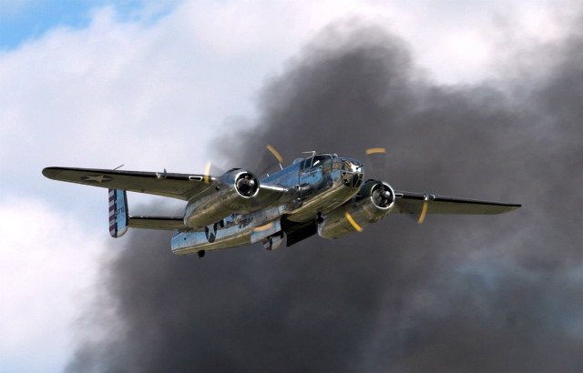 Blue silver plane flying black free wallpaper - medium preview image