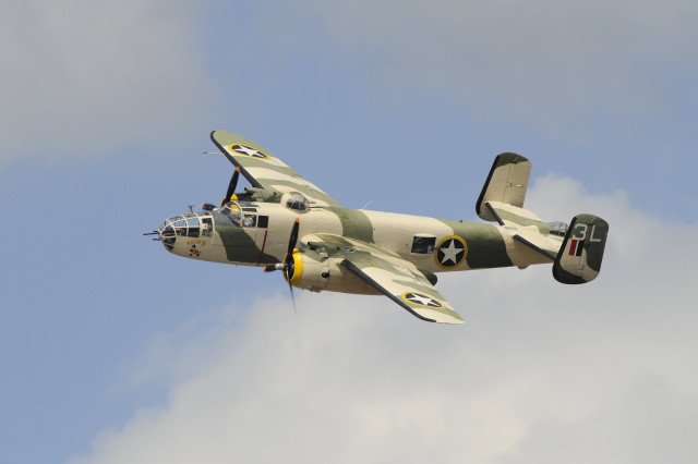 Small plane cloudy sky propeller #2 free wallpaper - medium preview image