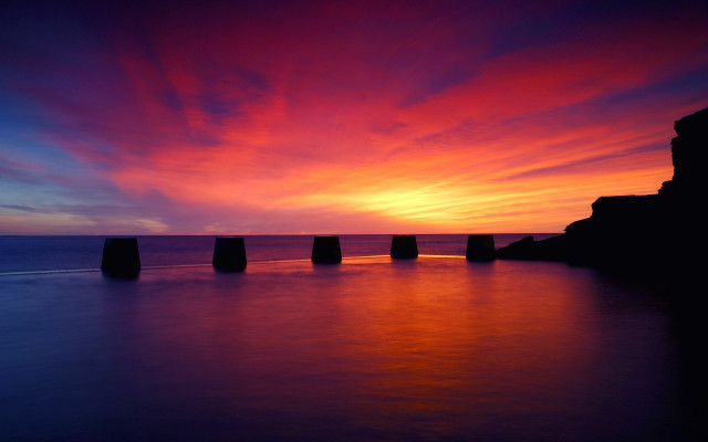 Sunset pillars water clouds sky free wallpaper - medium preview image