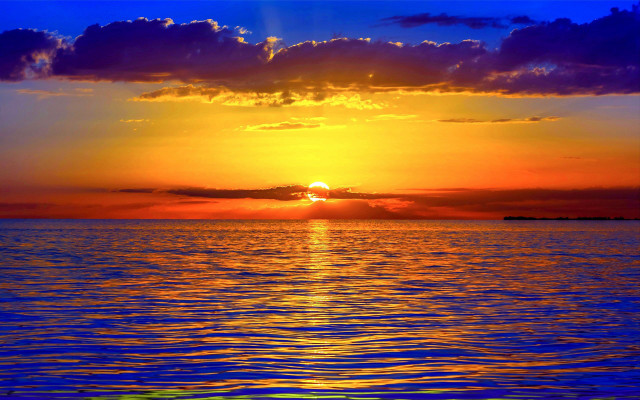 Sunset ocean boat distance clouds free wallpaper - medium preview image