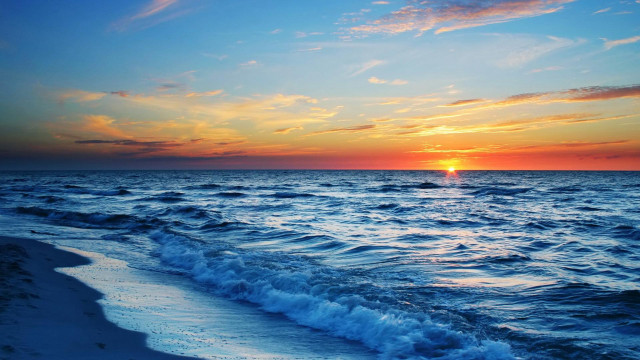 Sunset ocean waves boat distance #2 free wallpaper - medium preview image