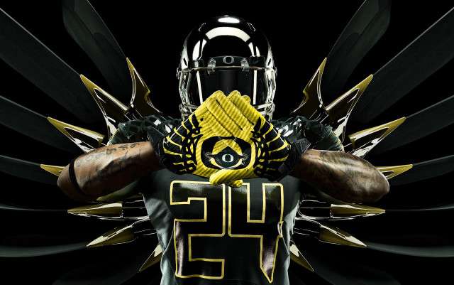 Football player yellow black uniform #2 free wallpaper - medium preview image