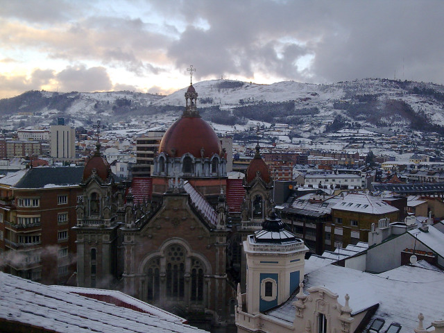 Snowy city mountain clouds winter free wallpaper - medium preview image