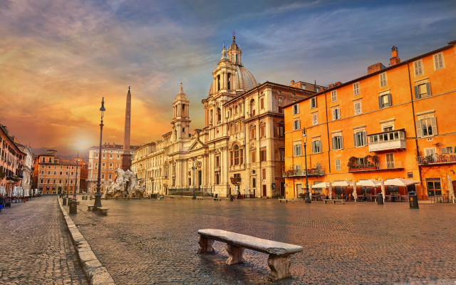 Bench cobblestone street tall building free wallpaper - medium preview image