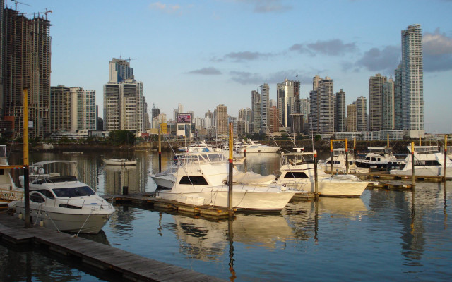 Marina boats city tall buildings free wallpaper - medium preview image