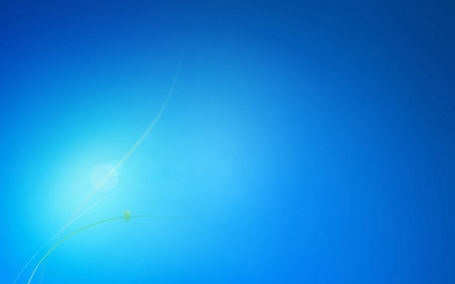 Blue sky green kite flying free wallpaper - medium preview image