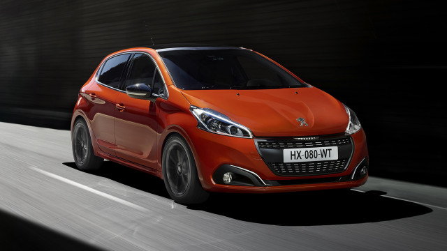 Small orange car smoke tunnel free wallpaper - medium preview image