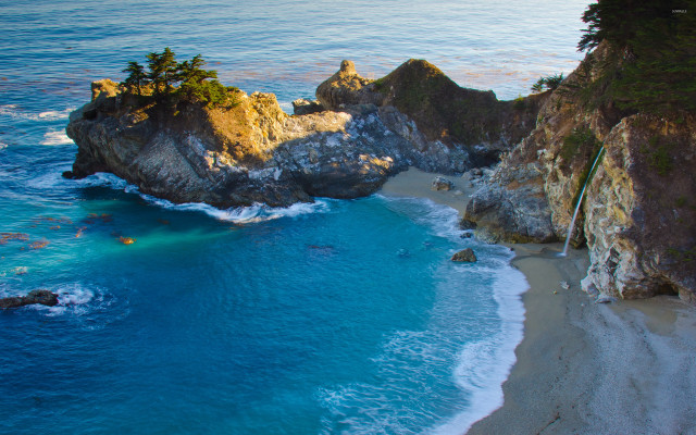 Beach cliff water wave swimming free wallpaper - medium preview image