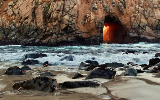 Cave entrance red light ocean free wallpaper - medium preview image