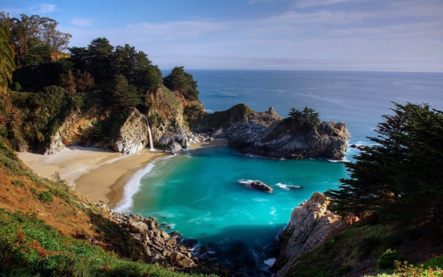 Beach blue water trees rocks free wallpaper - medium preview image