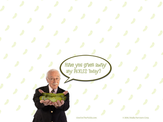 Man holding green object thought free wallpaper - medium preview image