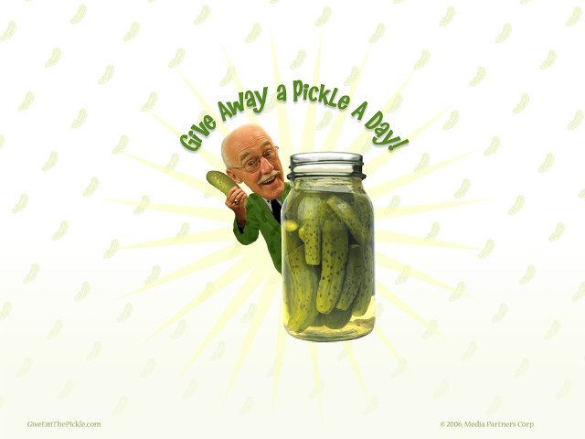Man holding pickle in jar free wallpaper - medium preview image