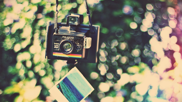 Camera chain polaroid print hanging free wallpaper - medium preview image