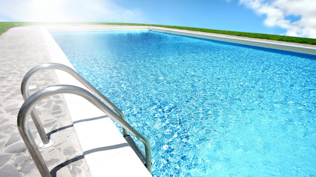 Pool metal railing grassy area free wallpaper - medium preview image