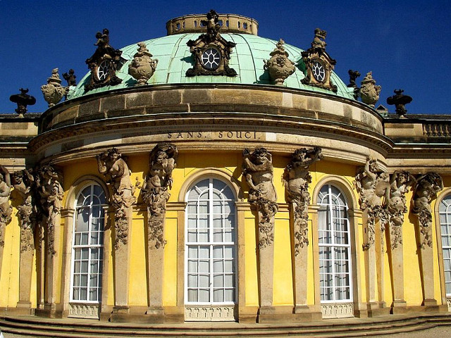 Building green roof clock windows free wallpaper - medium preview image
