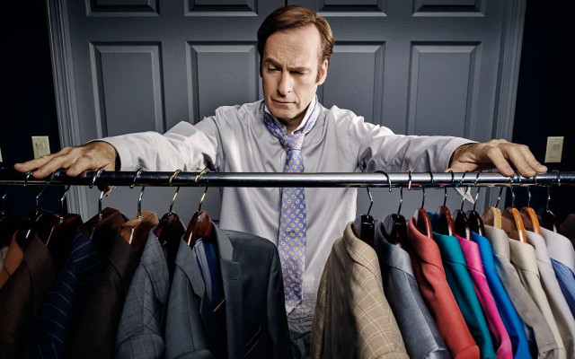 Man standing ties suits closet free wallpaper - medium preview image