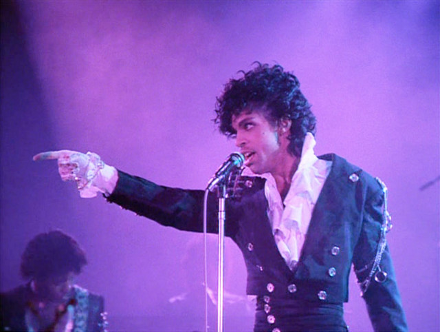 Man suit microphone pointing stage free wallpaper - medium preview image