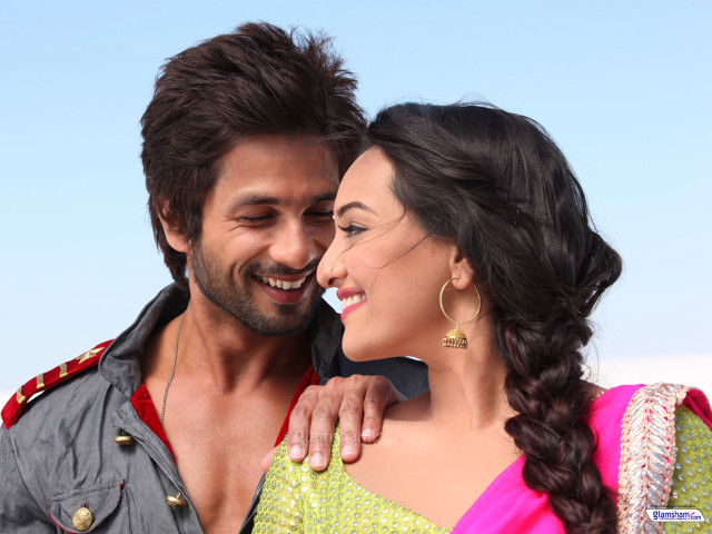 Smiling man woman posing together free wallpaper - medium preview image