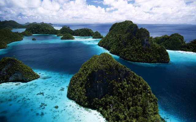 Islands ocean trees water clouds free wallpaper - medium preview image