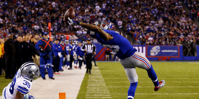 Football player jumping catch ball free wallpaper - medium preview image