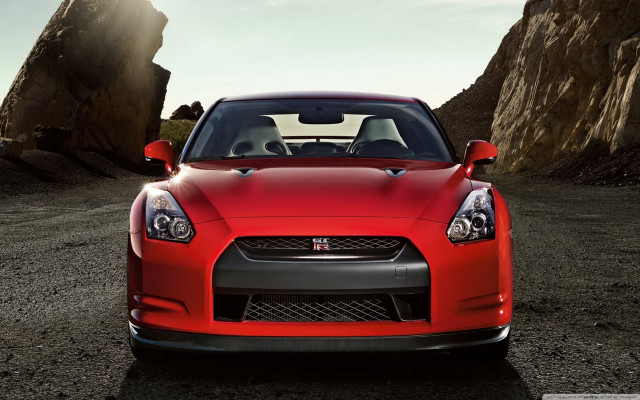 Red sports car rocky sunbeam free wallpaper - medium preview image
