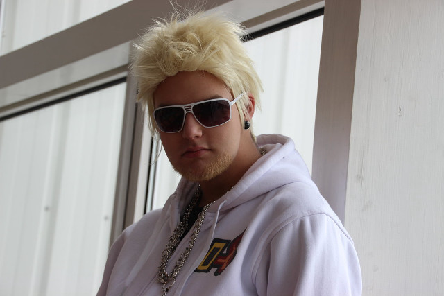 Blonde man sunglasses cellphone window free wallpaper - medium preview image