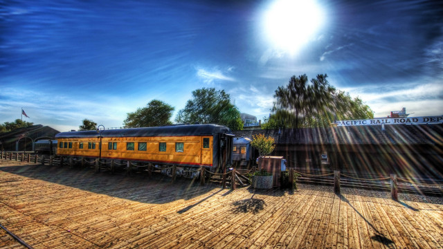 Train fence trees clocktower cityscape free wallpaper - medium preview image
