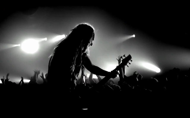 Man playing guitar concert crowd #2 free wallpaper - medium preview image