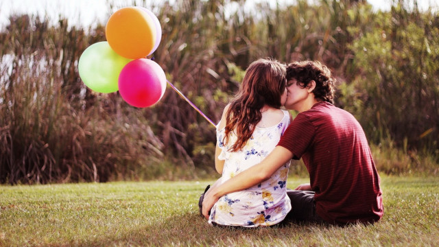 Couple kissing balloons field grass #3 free wallpaper - medium preview image