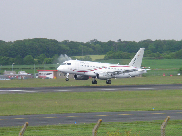Large jet takeoff forest grass free wallpaper - medium preview image