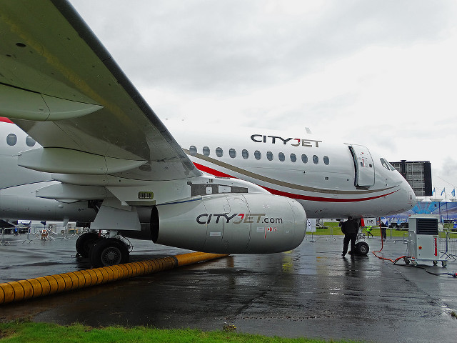Jetliner airport tarmac yellow hose free wallpaper - medium preview image