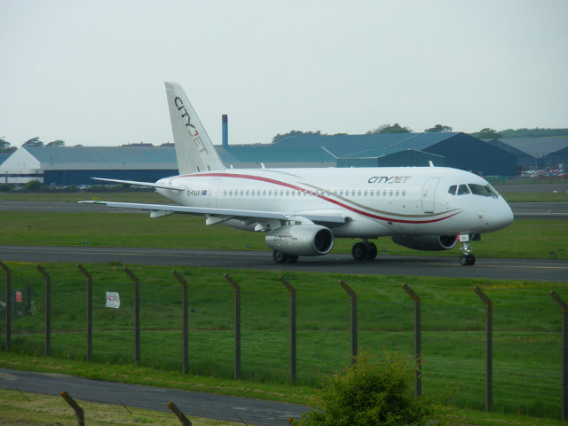 Large white airplane runway fence free wallpaper - medium preview image