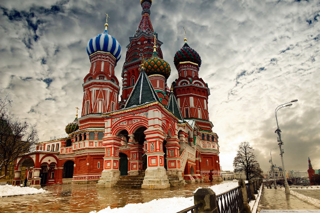 Large red building towers striped free wallpaper - medium preview image