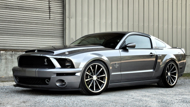Silver mustang parked building garage free wallpaper - medium preview image