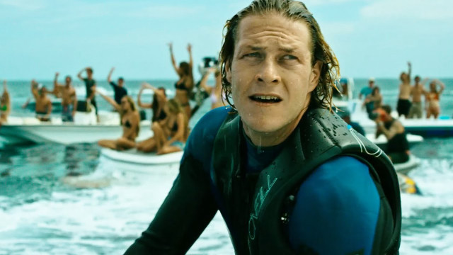Man wet suit standing water free wallpaper - medium preview image