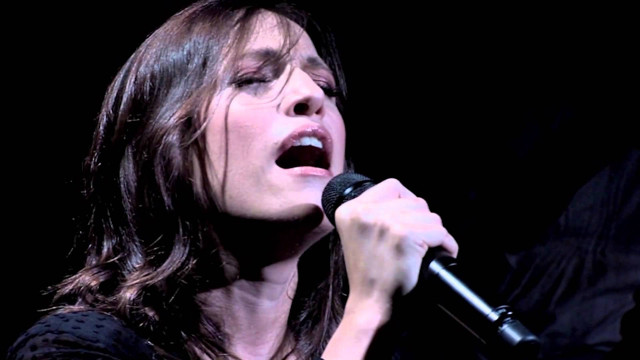 Woman singing microphone stage black free wallpaper - medium preview image