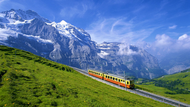 Train traveling tracks mountain range free wallpaper - medium preview image