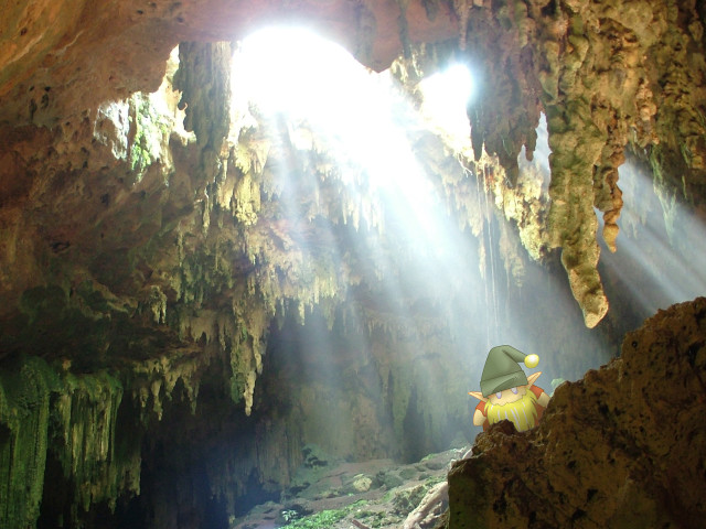 Cave light person green jacket free wallpaper - medium preview image