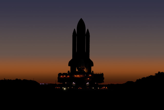 Large building rocket night sky free wallpaper - medium preview image