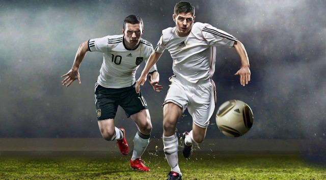 Soccer players running ball rain free wallpaper - medium preview image