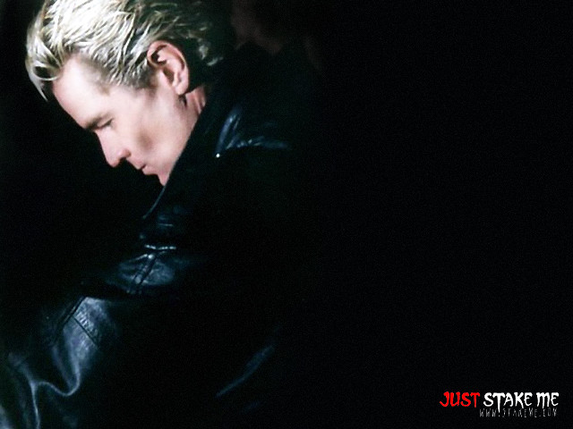 Man black jacket looking down free wallpaper - medium preview image