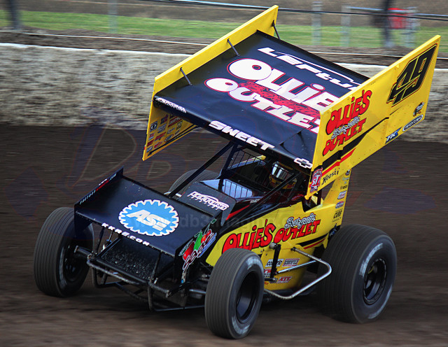 Yellow racecar blackflag dirttrack fence free wallpaper - medium preview image