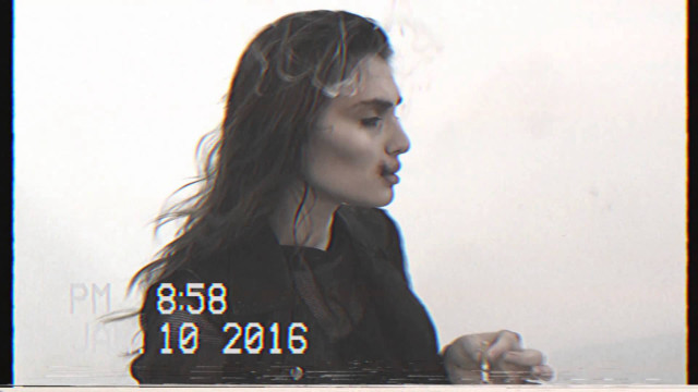 Woman smoking longhair blackjacket numbers free wallpaper - medium preview image