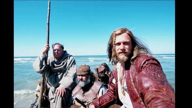 Costumed men beach sword leather free wallpaper - medium preview image